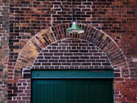 delivery door in old brick wall