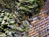 destroyed Victorian brick wall