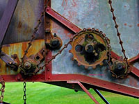 chain and gear system on an antique harvester