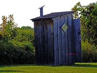outhouse in field