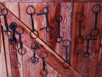horse harness equipment on wall