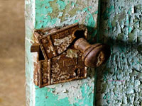old broken and rusted door lock