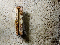 old rusted thermometer